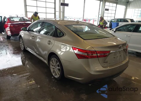 2014 Toyota Avalon Limited z USA, uszkodzony, nr VIN 4T1BK1EBXEU095522